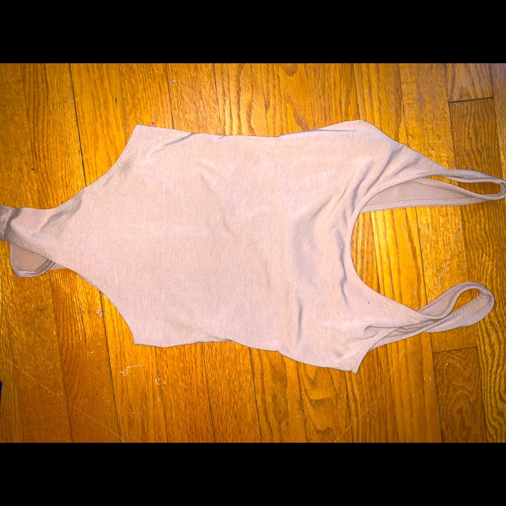 Tan body suit